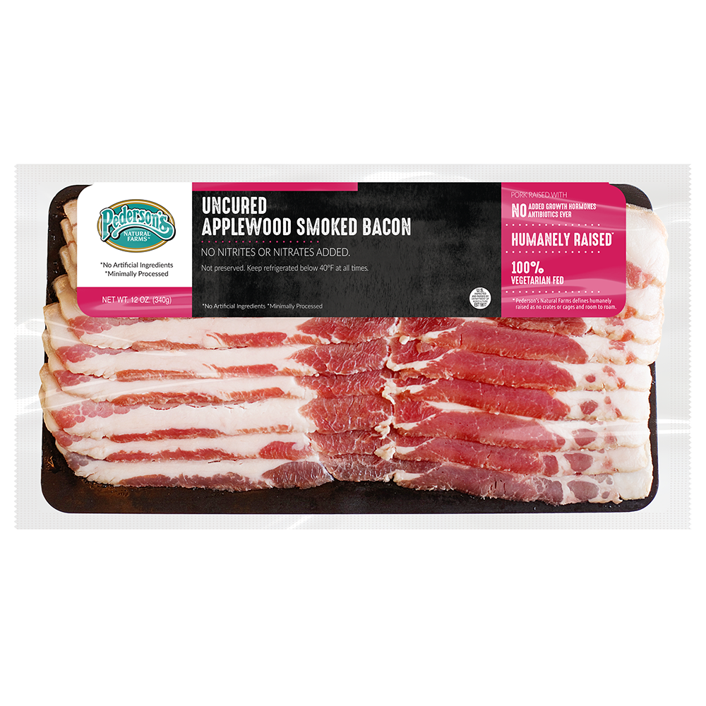 Apple wood smoked bacon package image with bacon inside, and pink/black/white label