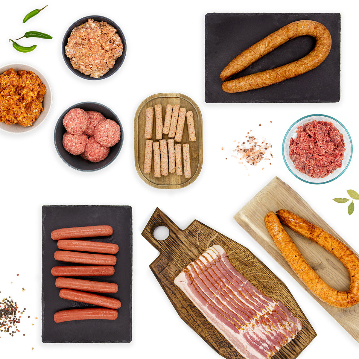 Whole30 Variety Pack lifestlye image featuring conected sausage, hot dogs, bacon, ground beef, ground sausage, breakfast sausage links, ground chorizo, ground bison